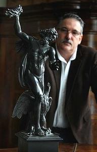 A fine figure … Colin Vickers and the bronze of Zeus that sold for $225,000.